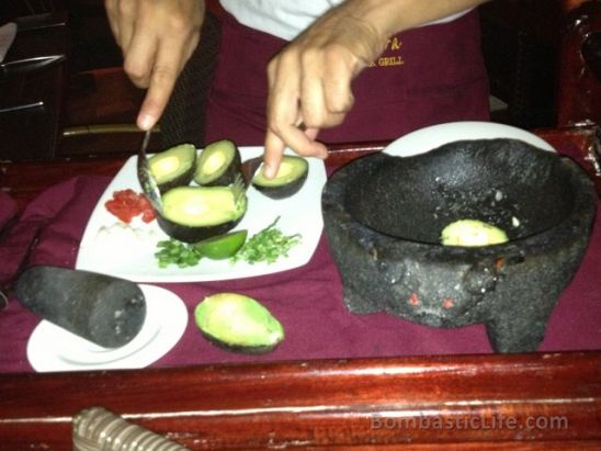 Making Guacamole at our table at Madre Tierra