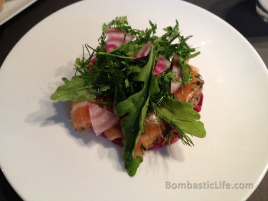Marinated salmon, beetroot vinegar and herbs salad