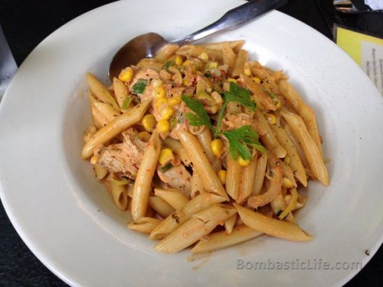 Penne pasta with chicken, sun dried tomatoes, onions and corn in a light Jerk cream sauce  Peter Pan Bistro