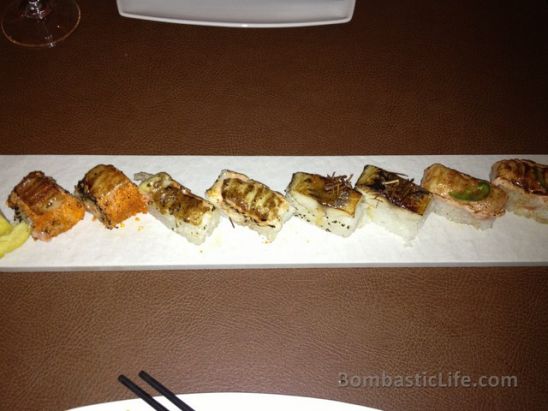 Aburicious Roll (two pieces of the ebi (tiger shrimp), saba (cured mackerel) roll, salmon roll and the JaBristroll (salmon, snow crab, uni and cucumber rolled in tobiko) roll at Jabistro in Toronto 