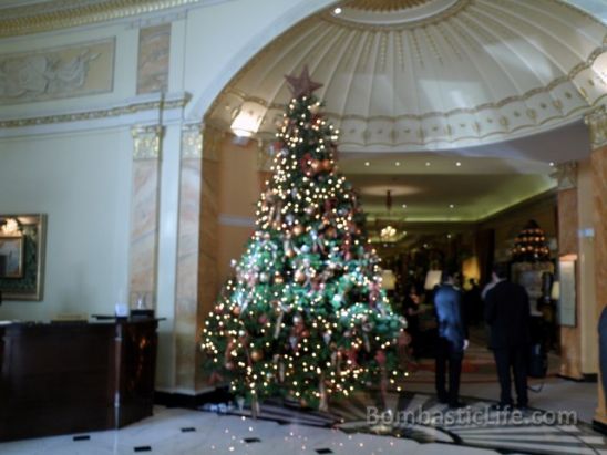 Lobby of The Dorchester Hotel in London, England decked out for Christmas.