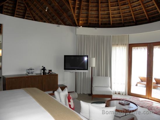 Bedroom of an over the water villas at W Hotel and Resort in the Maldives.