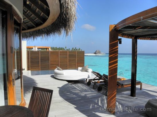 Private deck of an over the water villa at the W Hotel in the Maldives.
