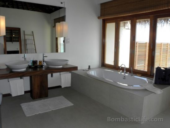 Bathroom of an over the water villas at W Hotel and Resort in the Maldives.