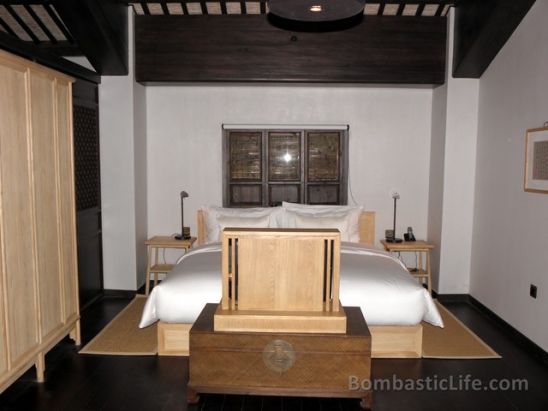 Bedroom of Deluxe Village Suite Number 8 at Amanfayun Resort in Hangzhou, China.