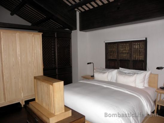 Bedroom of Deluxe Village Suite Number 8 at Amanfayun Resort in Hangzhou, China.