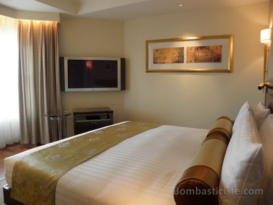 Bedroom of a Beijing Suite at the Peninsula Hotel in Beijing, China. 