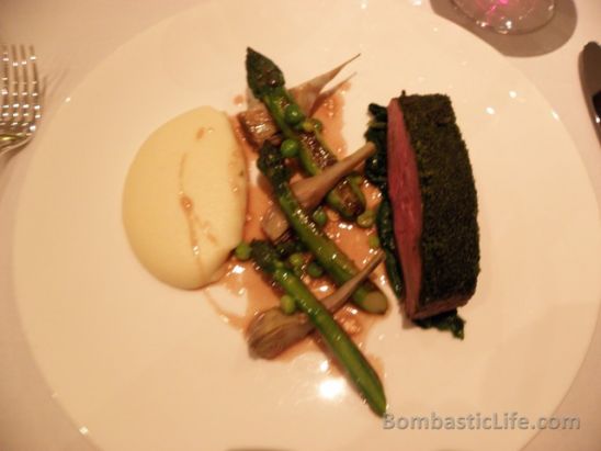 Herb Crusted Loin of Lamb with creamed potato, grilled asparagus and artichokes