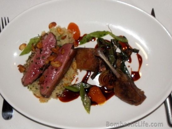 Liberty Farm duck breast and confit leg with toasted couscous, apricot puree, charred Farm spring onion, celery and aromatic duck jus at the Farm Restaurant at Carneros Inn - Napa Valley, CA