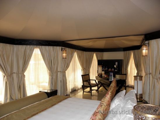 Bedroom and Work Area of an Al Sahari Tented Pool King Villa at Banyan Tree Al Wadi in Ras Al Khaimah.
