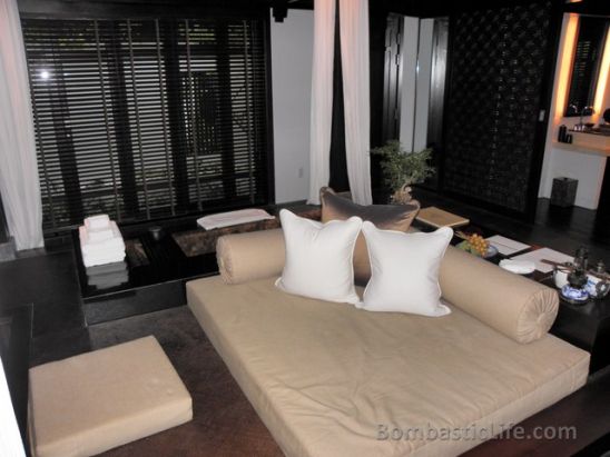 Daybed by the Soaking Tub in the Bedroom of Pool Villa at The Nam Hai Resort in Hoi An, Vietnam.
