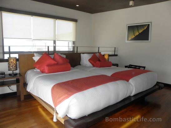 Bedroom of a One Bedroom Premiere Suite at Discovery Shores Resort in Boracay, Philippines.