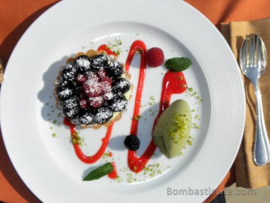 Wild berry pie with pistachio ice cream at De Pisis Restaurant in Venice. 