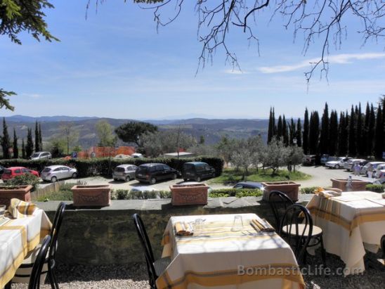 Outdoor dining area at La Bottega Restaurant in Tuscany. 