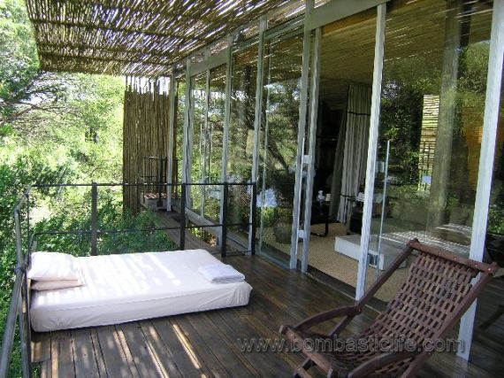Private Deck - Singita Sweni Lodge in South Africa.  They can put netting over the bed so you can sleep outside at night.