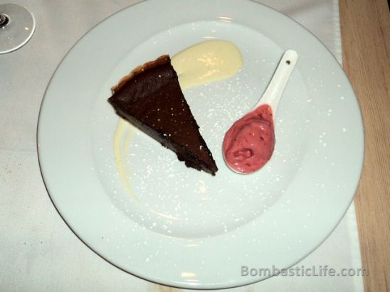 Dark chocolate tart with homemade ice cream at Graziella Italian Restaurant in Montreal 