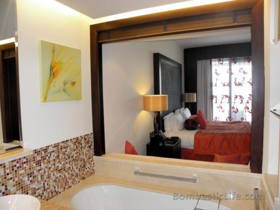 Bathroom of our Premier Room at The Address Hotel in Dubai.  Notice the open window to the Bedroom.