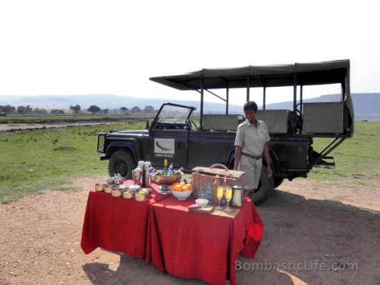 A welcome table with snacks and drinks before the short drive to camp. 