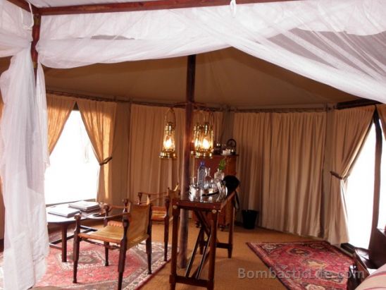 Sitting area in a luxury tent at Singita Sabora Tented Camp - Grumeti Reserves, Tanzania.