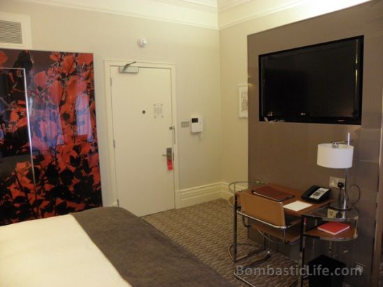 Deluxe room at Athenaeum Hotel in London.  There is a small closet on the right (behind the TV) and the mini bar on the left (behind the TV).