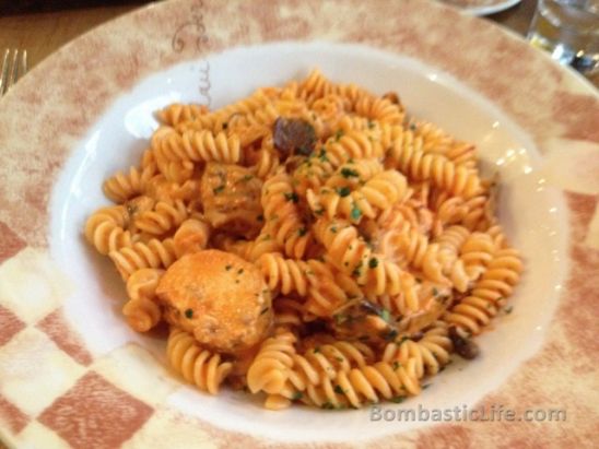 Fusilli Pasta with chicken and mushrooms in a rose tomato and cream sauce at Ciao Wine Bar in Toronto.